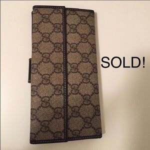 Authentic Gucci checkbook wallet with coin pouch